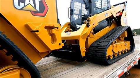 securing skid steer on trailer|youtube skid steer loader.